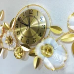 Detailed view of the Quality gold and white flowers and the metal clock face.